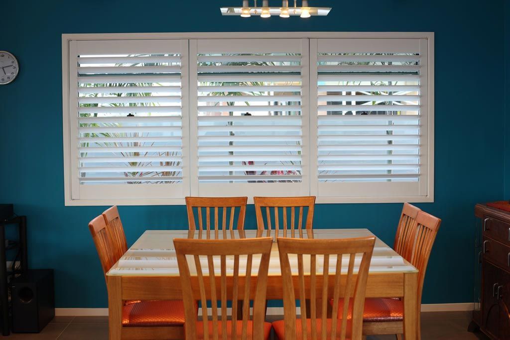 White Plantation Shutters In The Dining Room