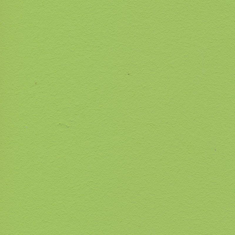 Eine Nahaufnahme einer grünen Papierstruktur.