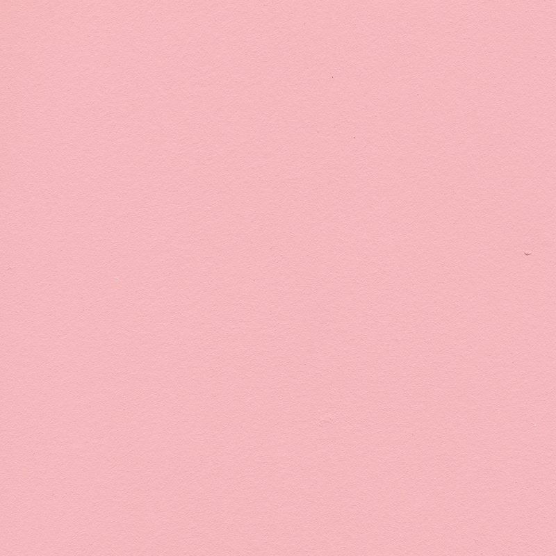 Eine Nahaufnahme eines rosa Hintergrunds mit einer einfachen Textur.