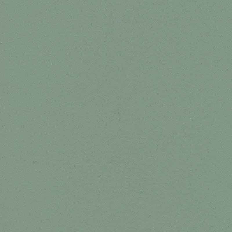 Eine Nahaufnahme einer grünen Papierstruktur.