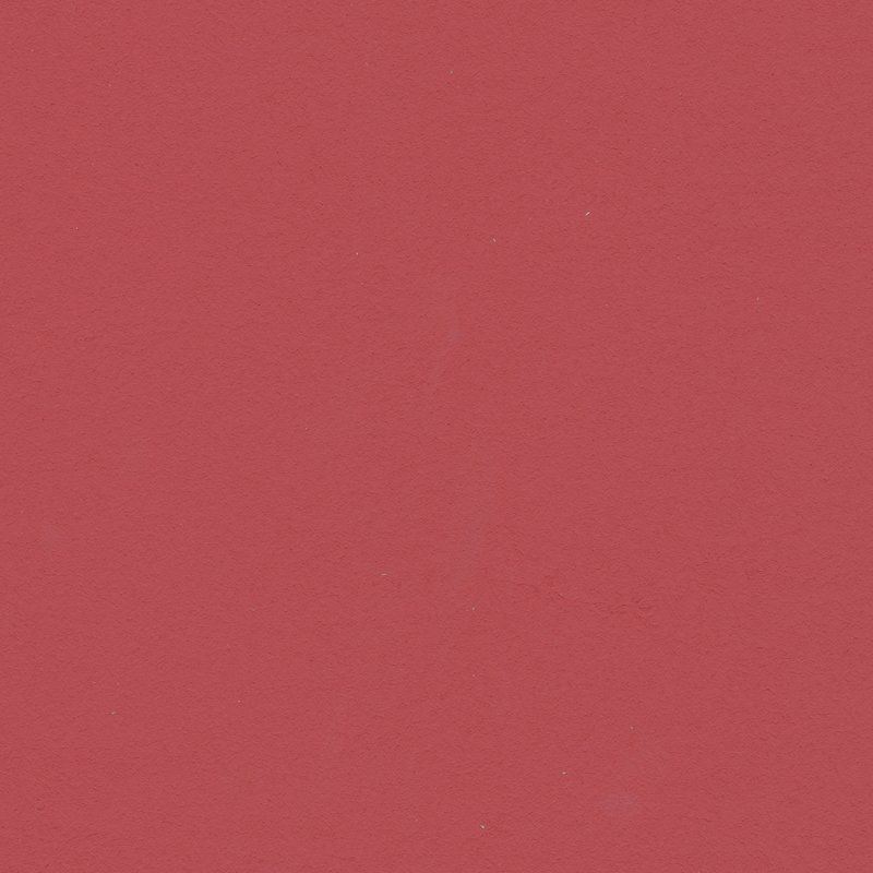 Eine Nahaufnahme eines roten Hintergrunds mit einer einfachen Textur.
