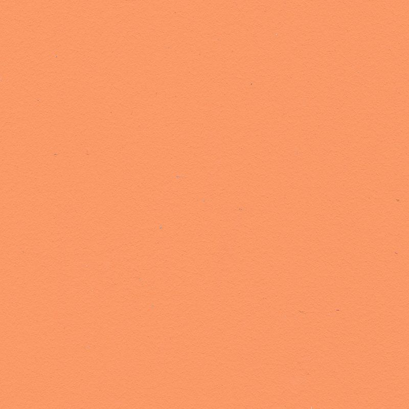 Eine Nahaufnahme eines orangefarbenen Stücks Papier.