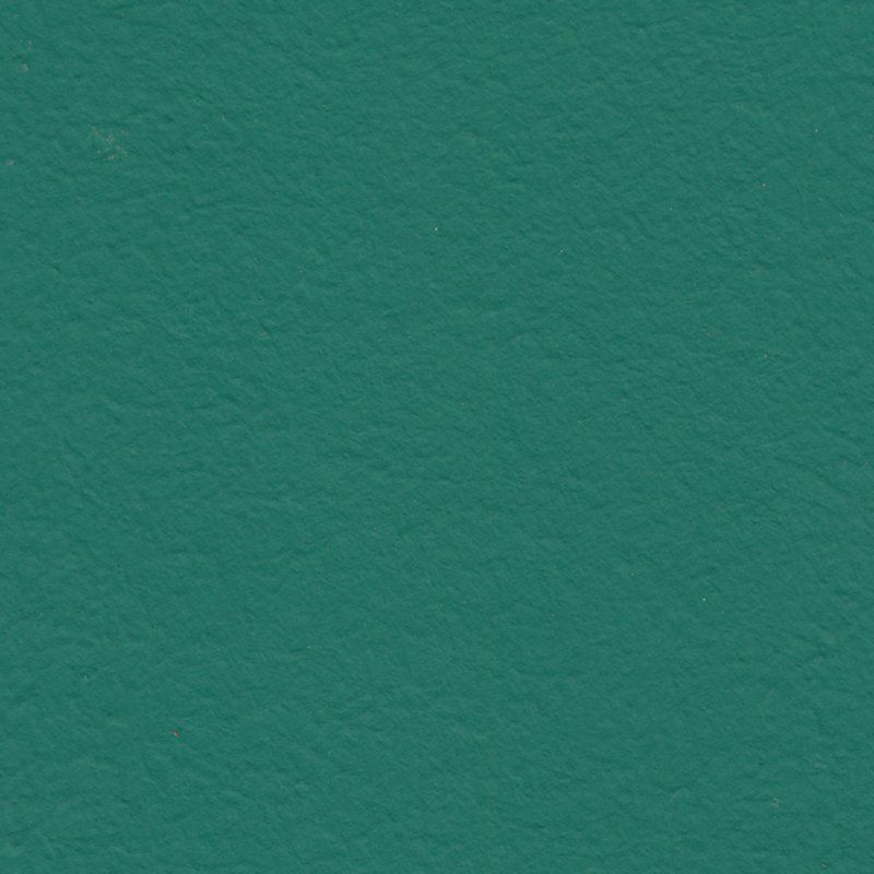 Eine Nahaufnahme einer grünen Papierstruktur.