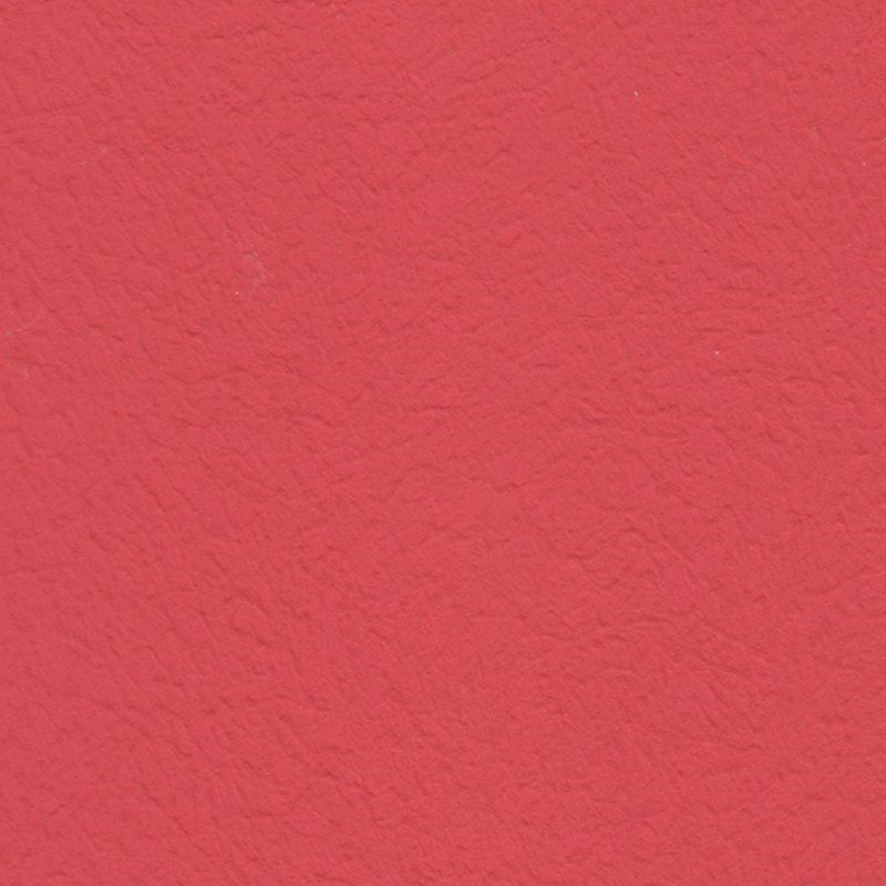 Eine Nahaufnahme einer roten Papierstruktur.