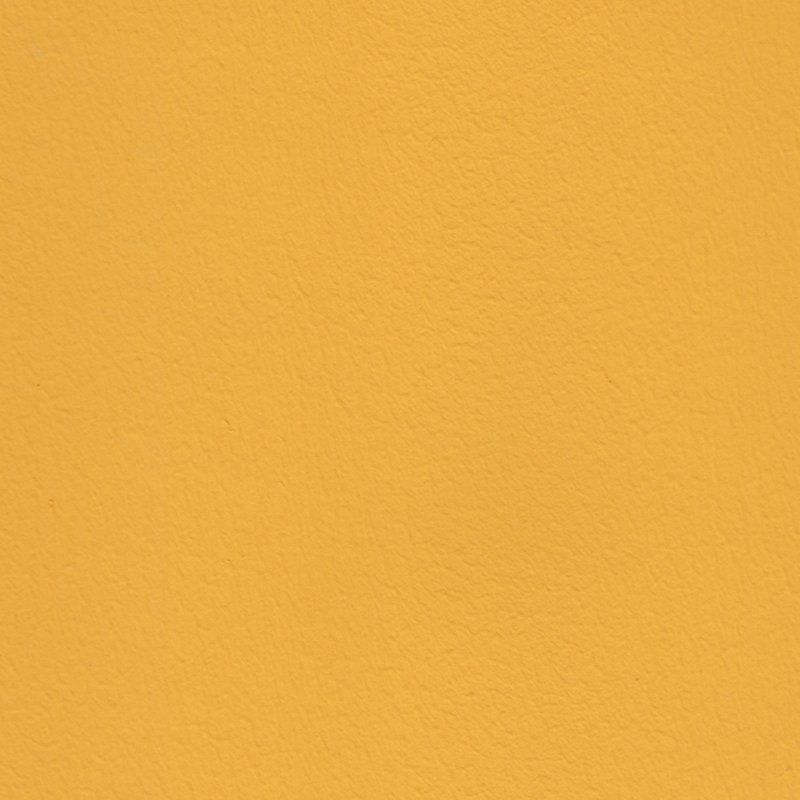 Eine Nahaufnahme einer gelben Papierstruktur.