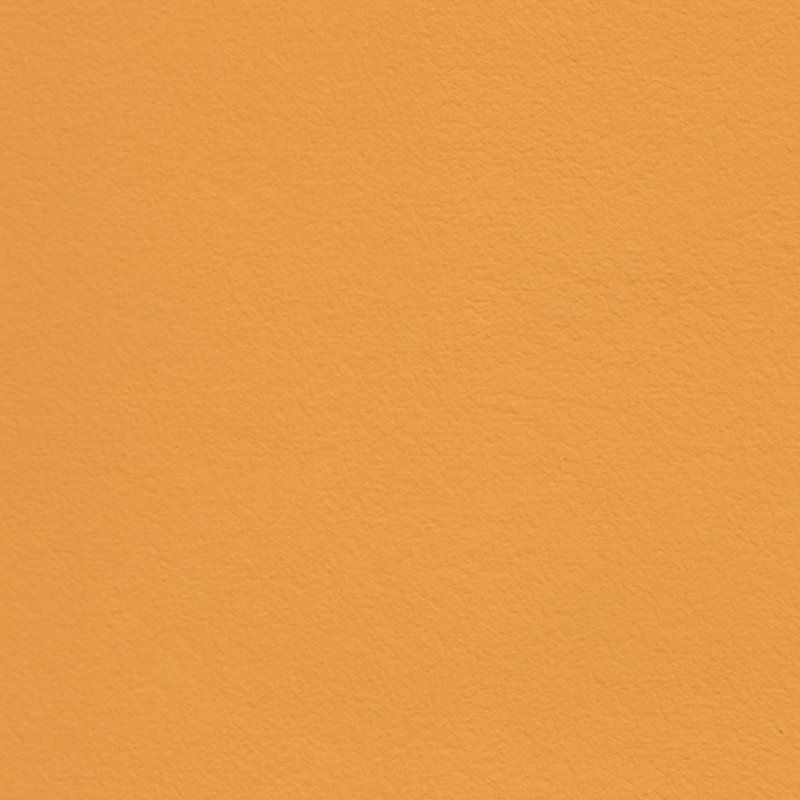 Eine Nahaufnahme eines orangefarbenen Stücks Papier.