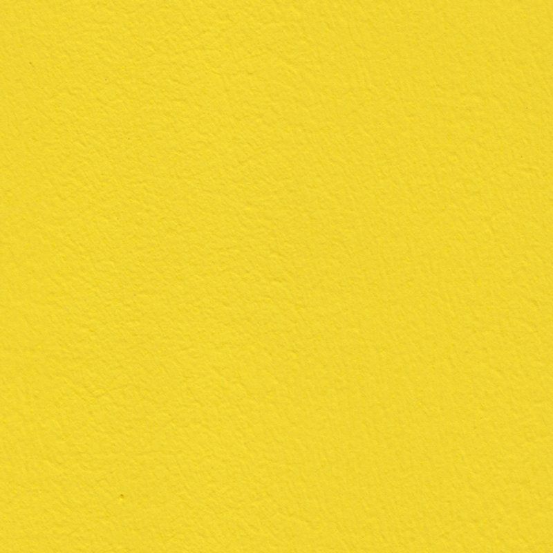 Eine Nahaufnahme einer gelben Papierstruktur.