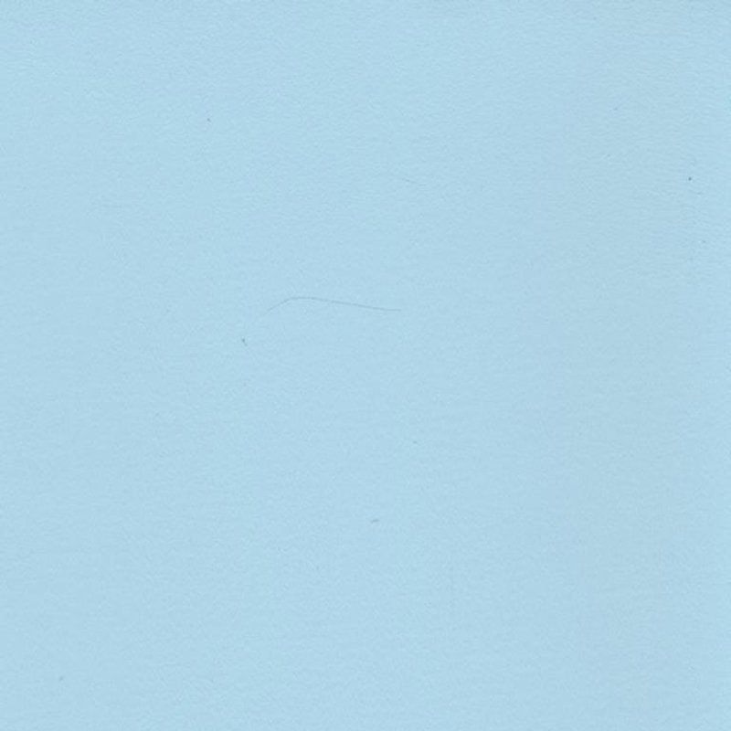 Eine Nahaufnahme einer hellblauen Papierstruktur.