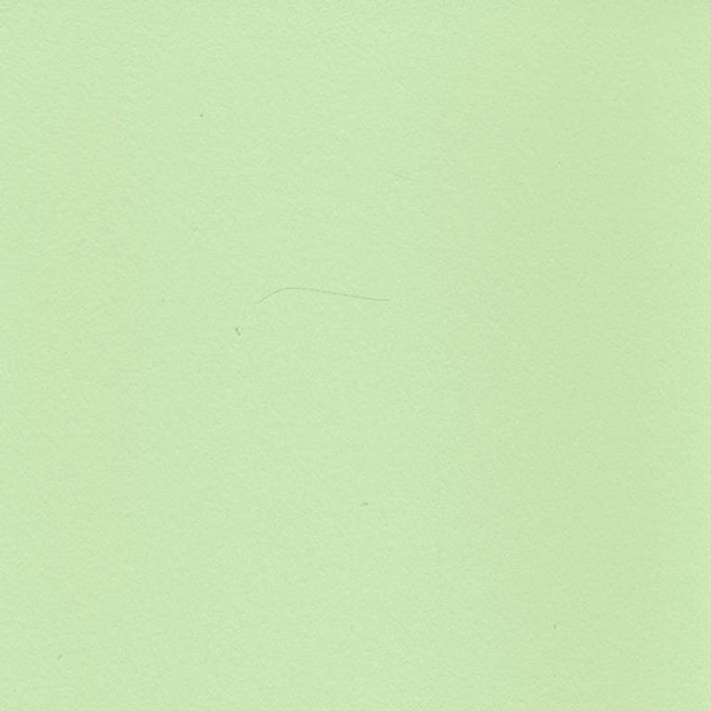 Eine Nahaufnahme einer hellgrünen Papierstruktur.
