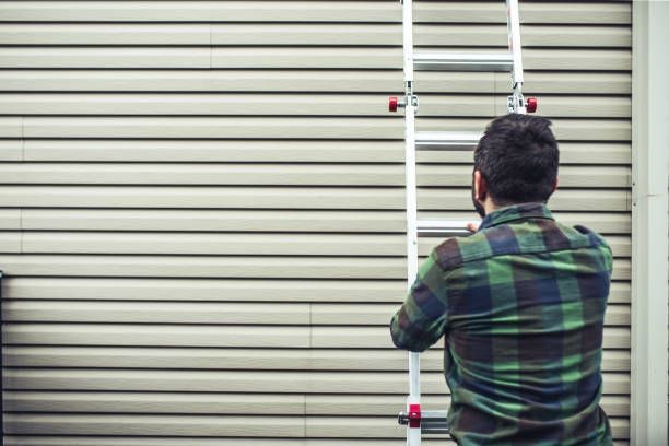 Man With A Ladder — Fort Atkinson, WI — SCHLOESSER CONSTRUCTION