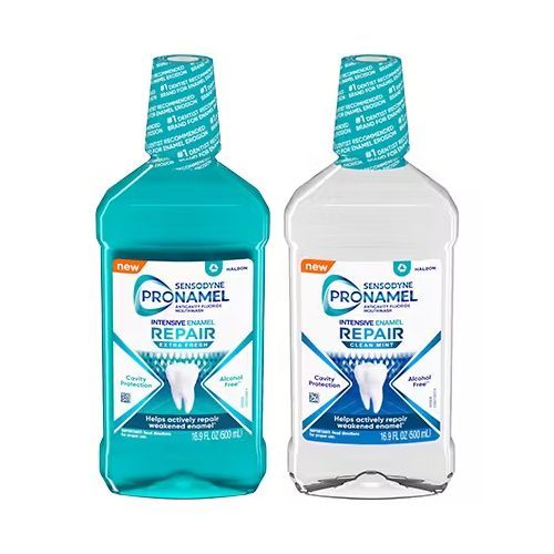 Two bottles of Pronamel mouthwash: blue and clear, on a white background.