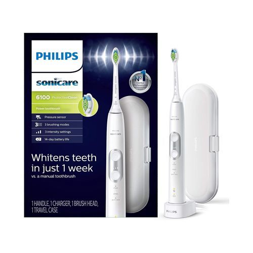 A philips sonicare electric toothbrush with a charger and case.