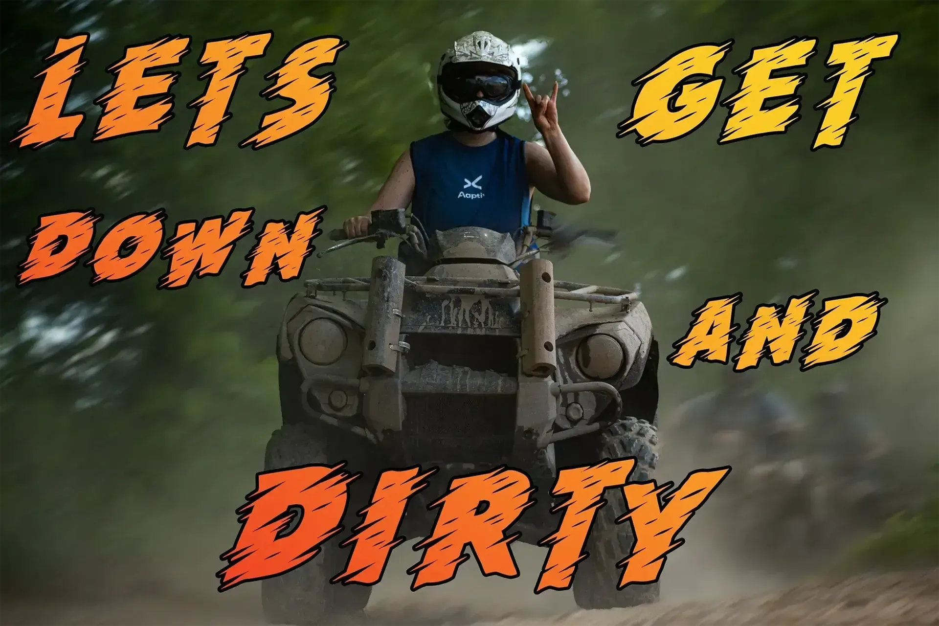 A man is riding an atv on a dirt road with the words lets get down and dirty above him