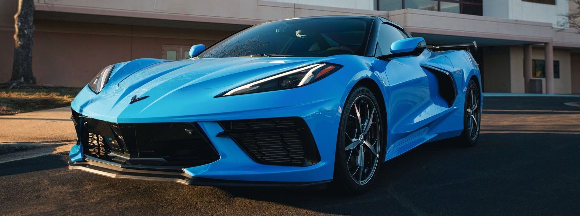a blue car at Cars & Coffee Roxboro