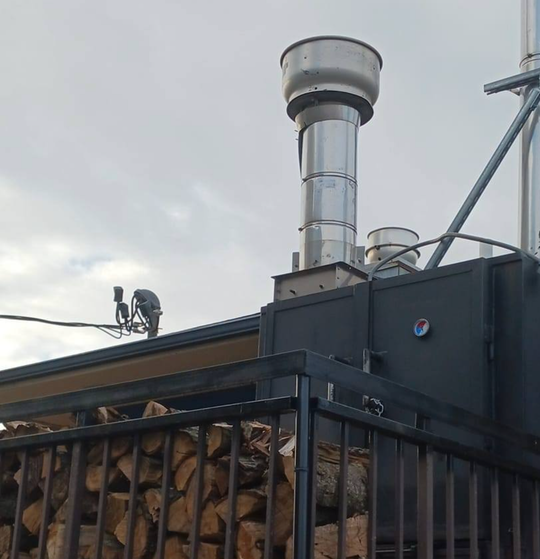 A building with a chimney on top of it