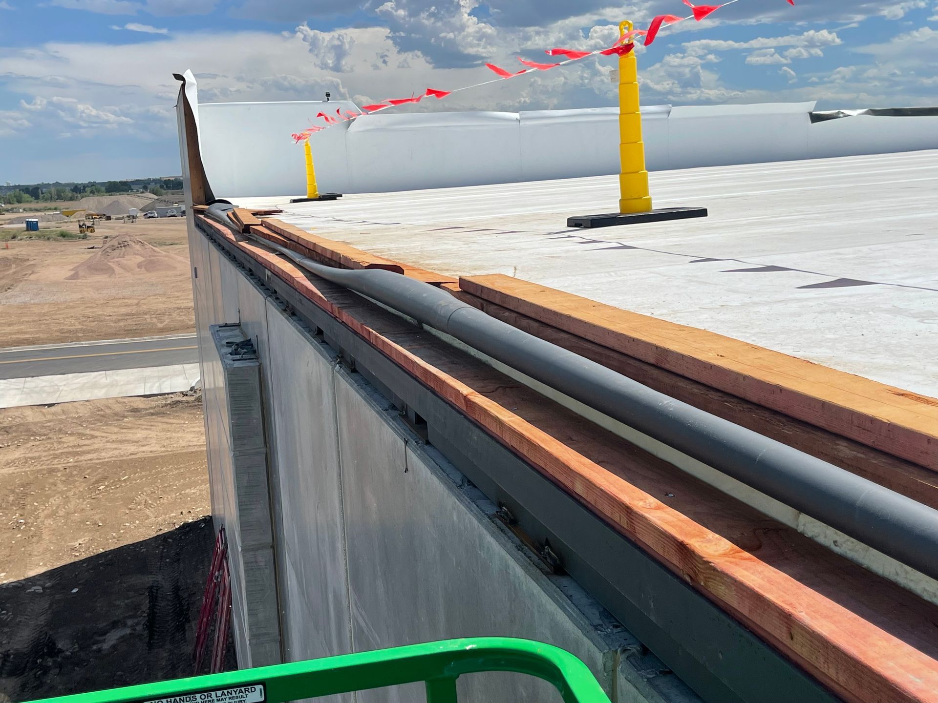 A roof with a bunch of wires on it