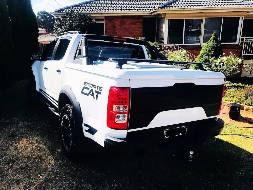 A White Pickup Truck Is Seen Parked Outside A House — Shine Your Ride In Bungendore, NSW