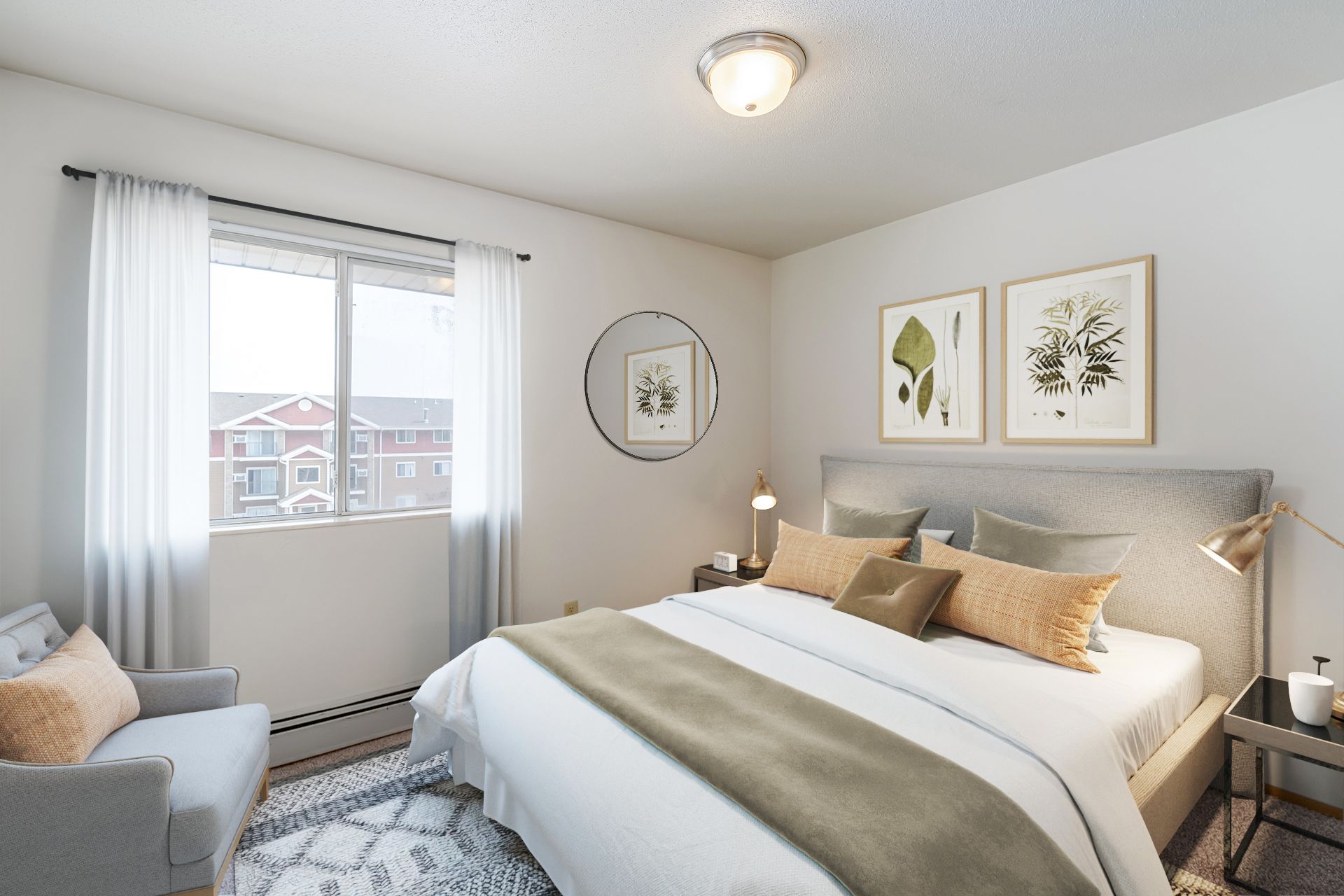 a bedroom with a large bed , chair and window .
