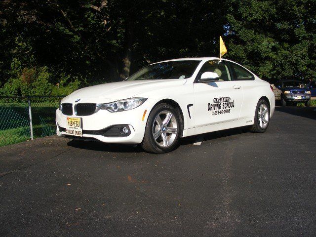 Defensive Driving — White BMW Car in Freehold, NJ