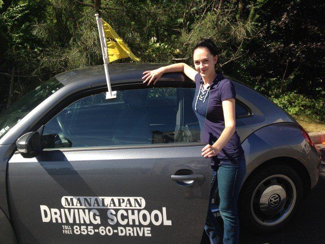 Driving School For Young — Girl Standing Beside Volkswagen Car in Freehold, NJ