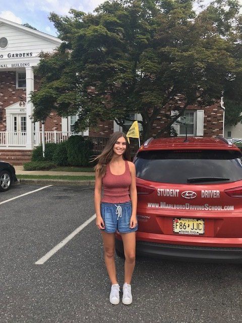 Female Student Smiling — Morganville, NJ — Marlboro Driving School