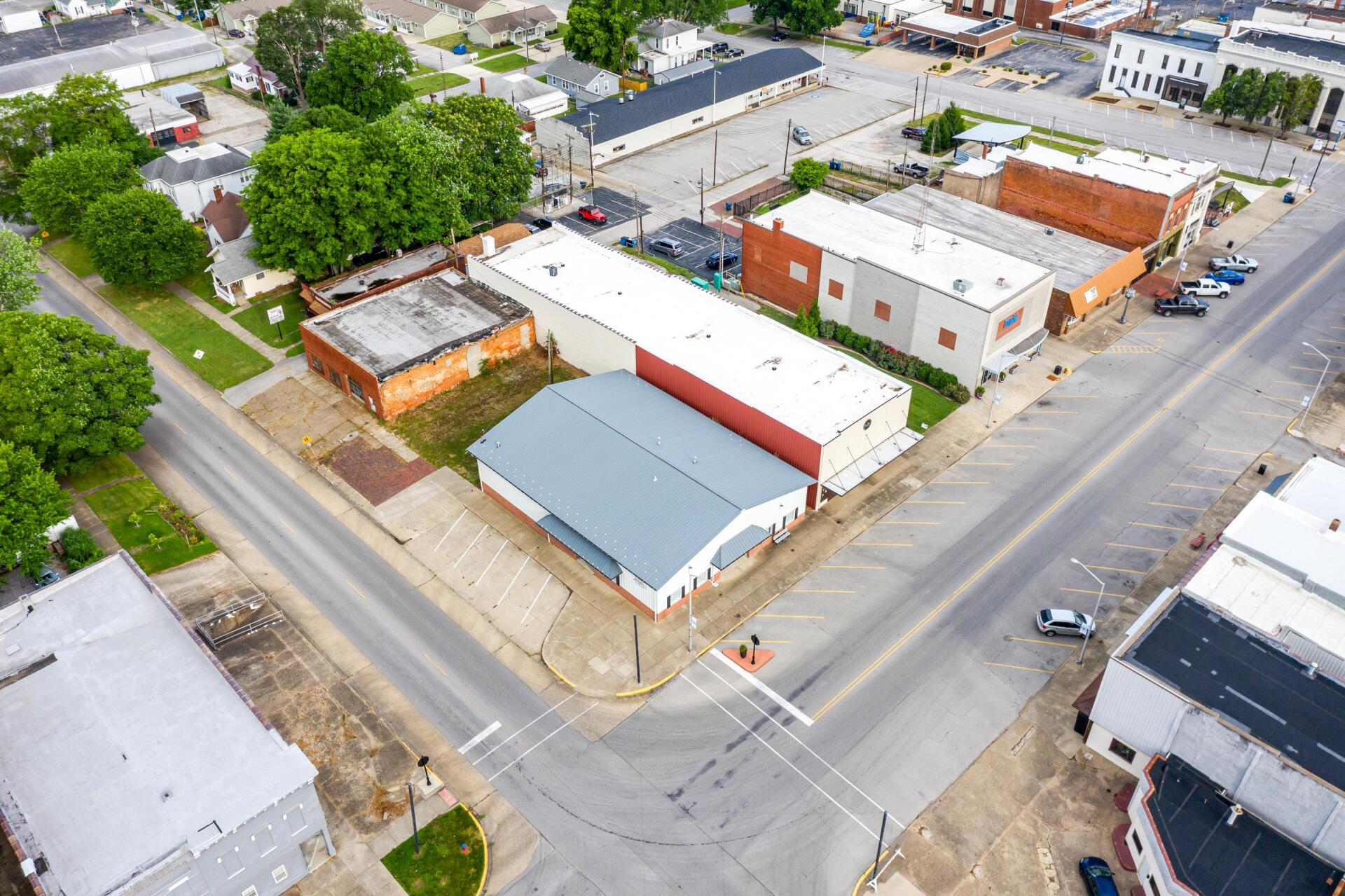 An aerial view of a city with a lot of buildings and trees