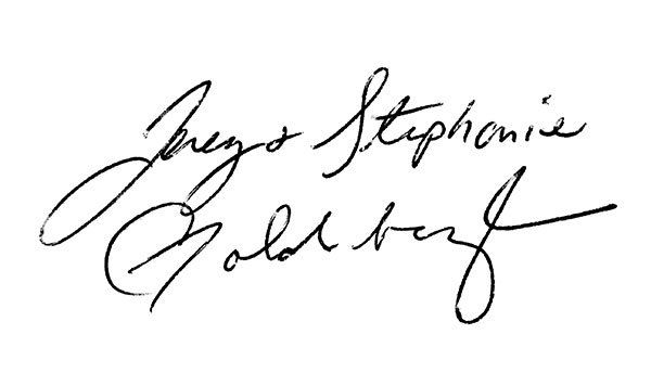 A close up of a person 's signature on a white background.