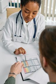 doctor writing referral