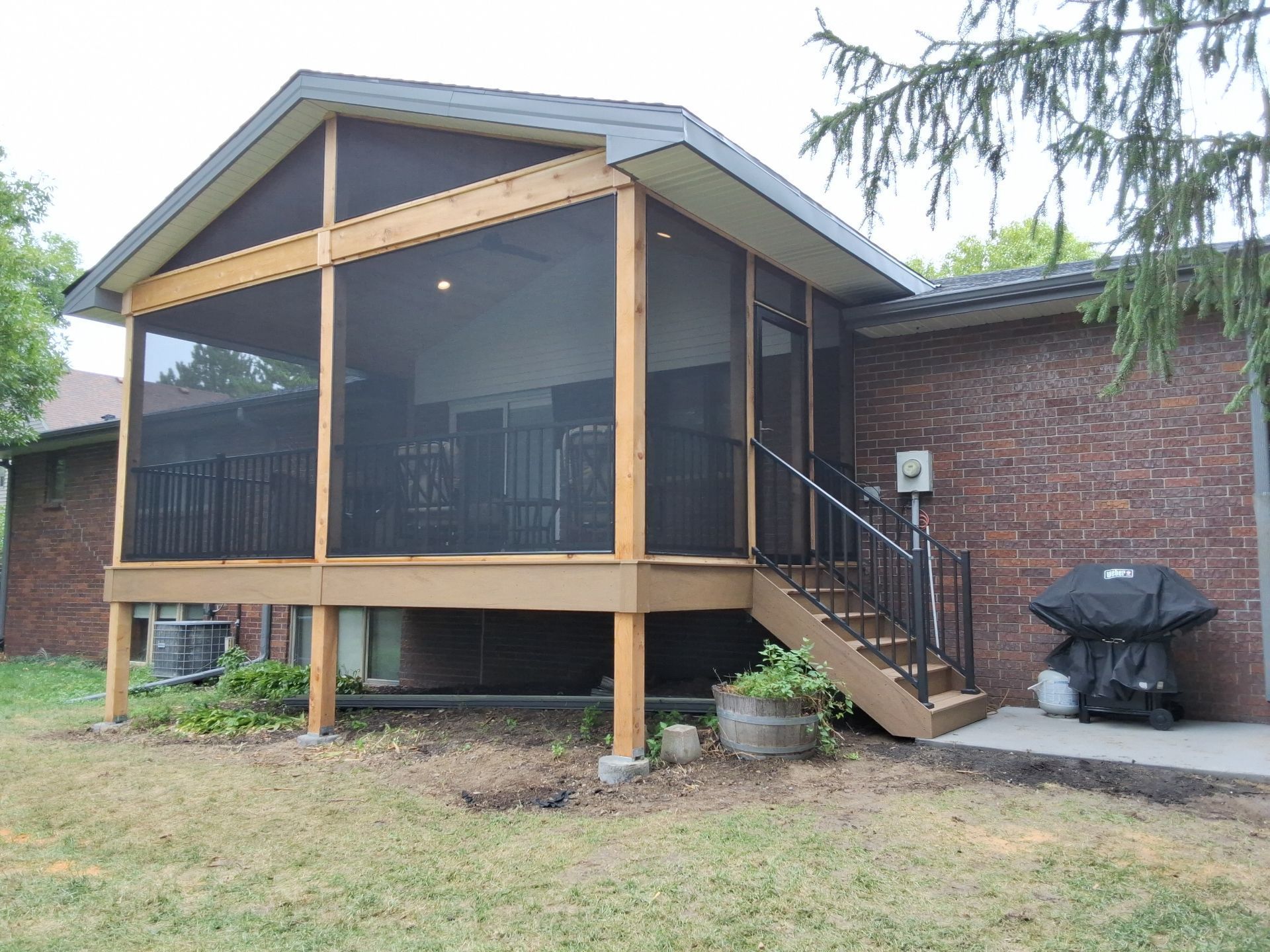 Deck with metal railings.