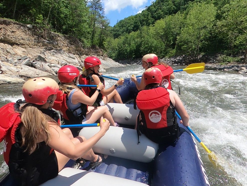 Map showing Pigeon River route, attractions (Sevierville, Dollywood), and Big Creek Expeditions in the Great Smoky Mountains.