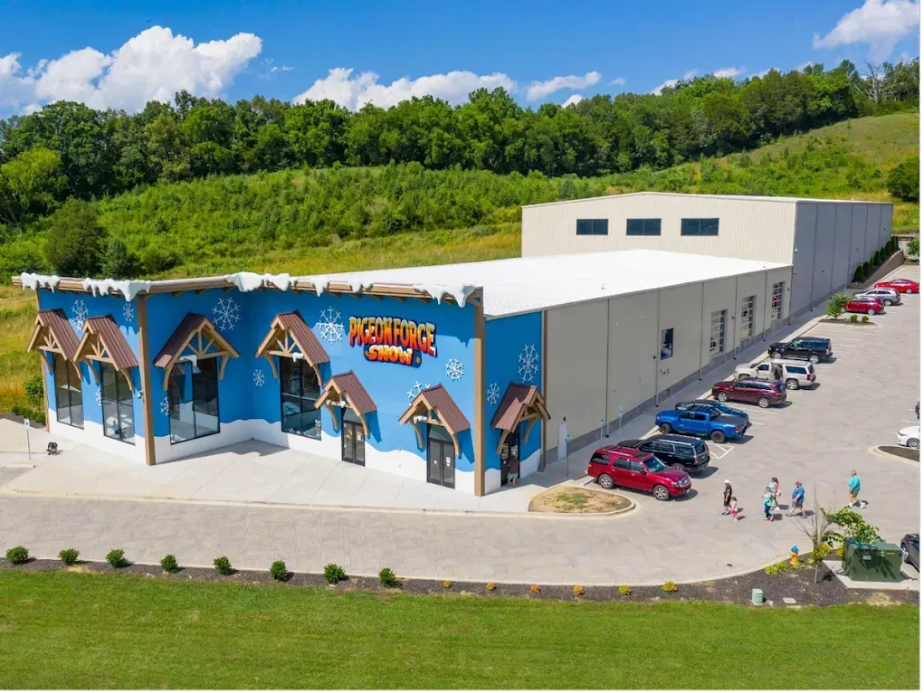 An aerial view of a bright blue building labeled 