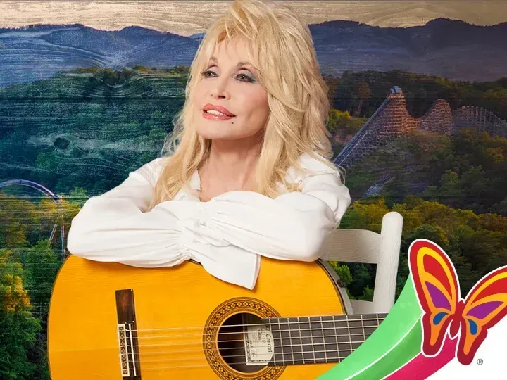 Dolly Parton with a guitar in front of a landscape featuring mountains and a rollercoaster, with a butterfly logo.