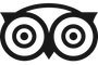 TripAdvisor logo featuring a stylized black and white owl face with large circular eyes.