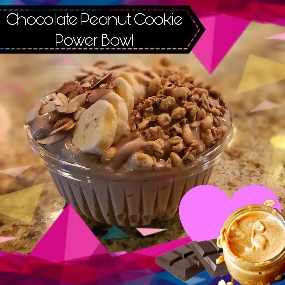 Chocolate peanut cookie power bowl with granola, banana slices, and almonds.