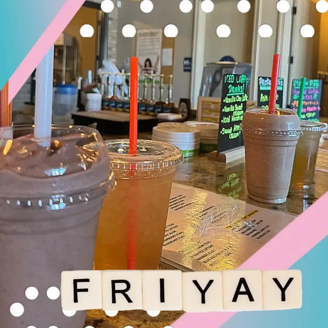 Three drinks on a counter with a 