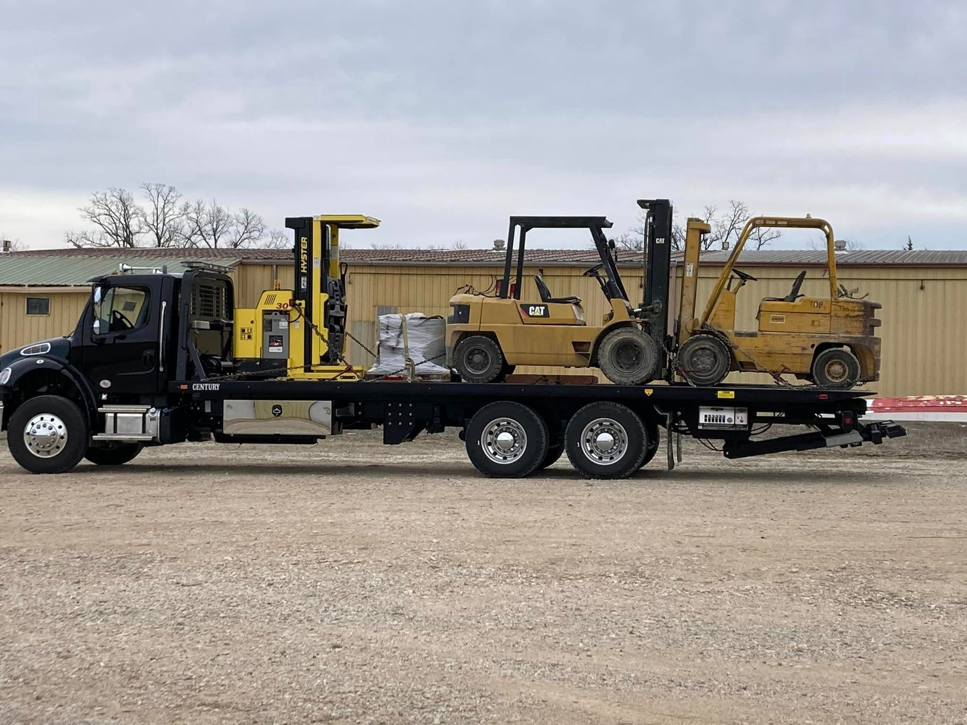 For Transporting Heavy Equipment in Columbia, MO, Call Tiger Towing for Hauling Service.