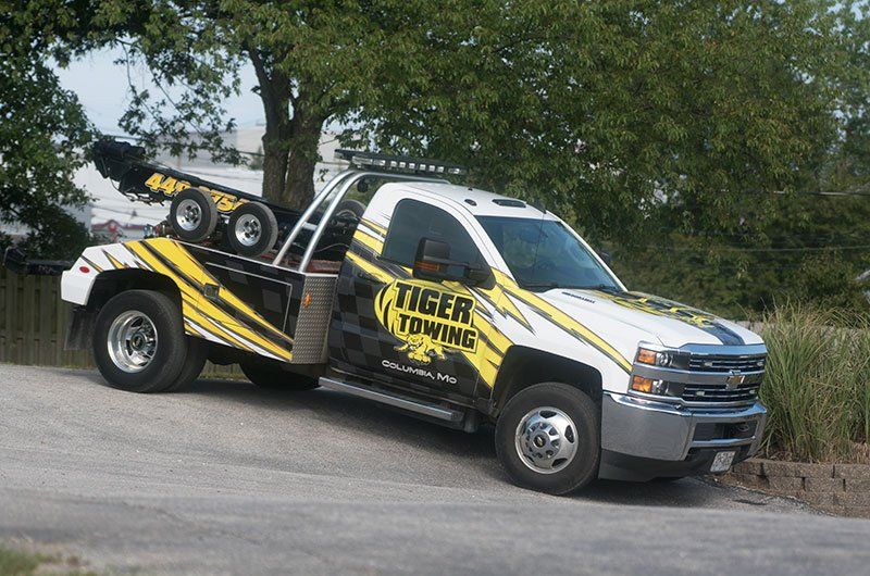Call Tiger Towing to pull your car out of ditches, snow, mud or water in Columbia, Mo.