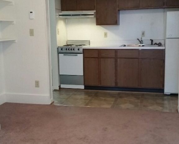 322-4 living room kitchen | 322 Steve Smith Apartments