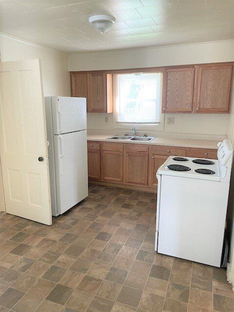 coconut grove apartments A kitchen