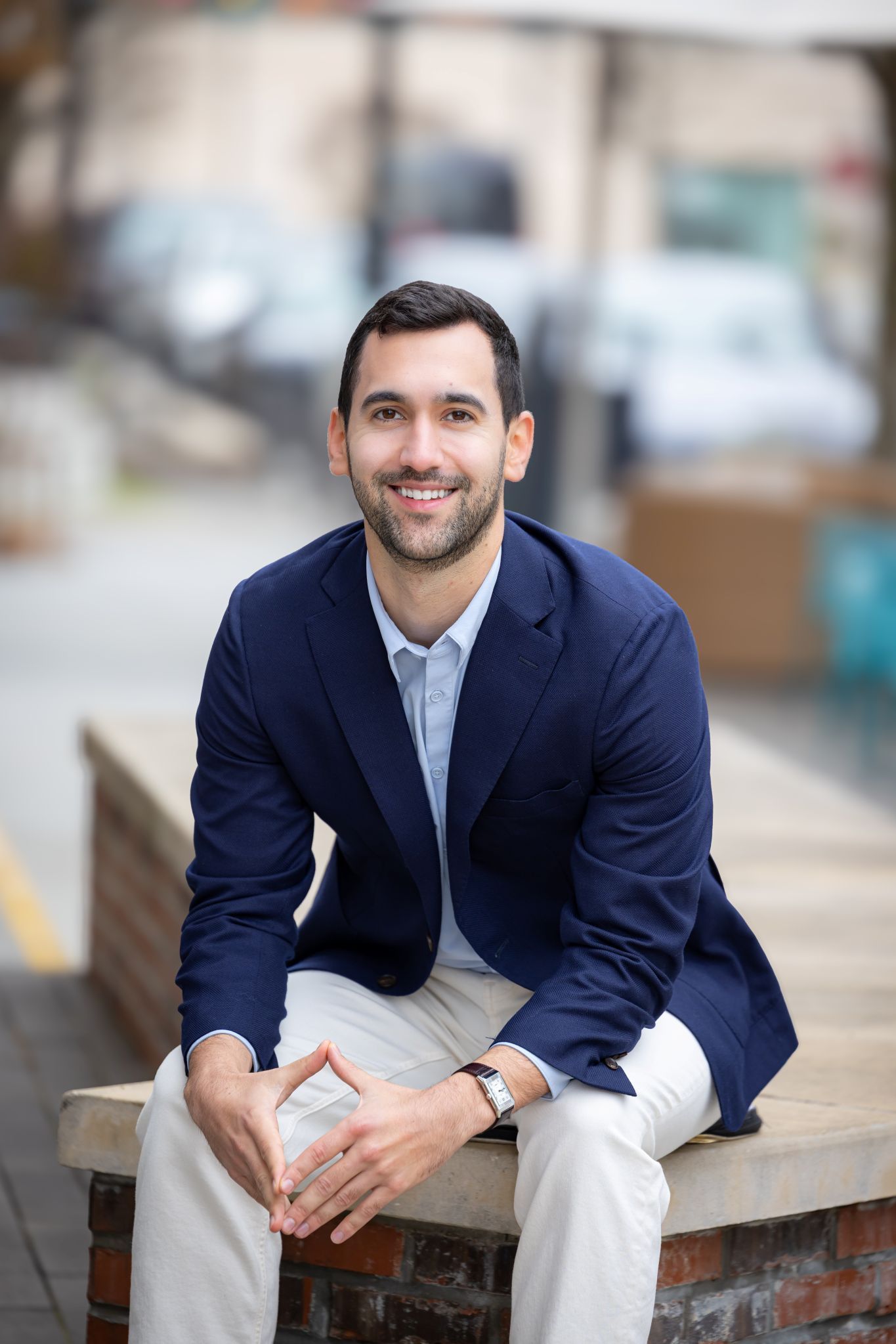A silhouette of a person in a square on a white background.