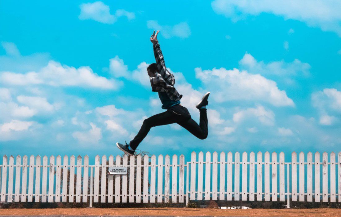 A Man Jump And Happy — Financial Advisor in Kingscliff, NSW