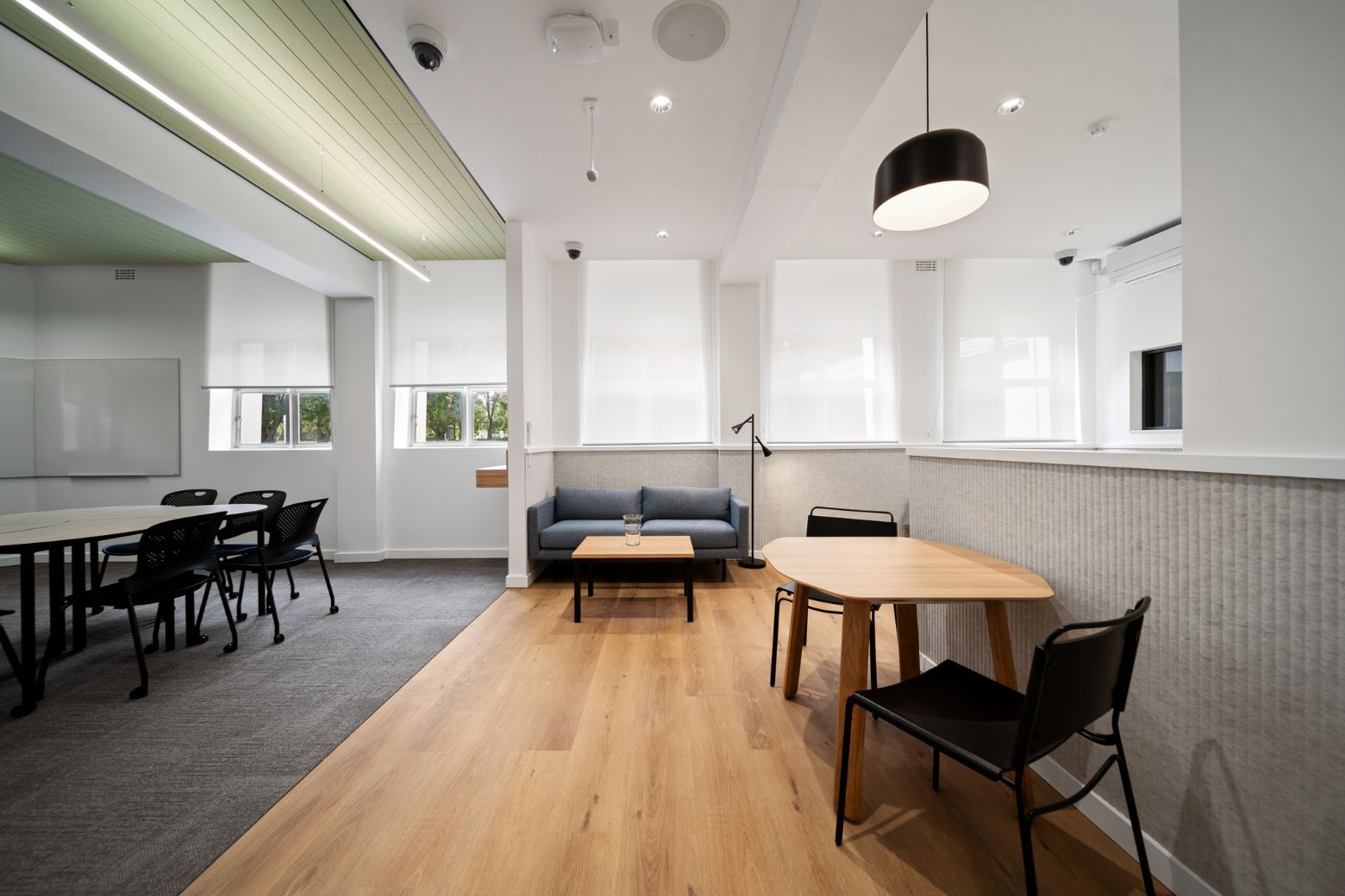 A Room With Desks And Chairs In It  — Moltus Construction in Braddon, ACT