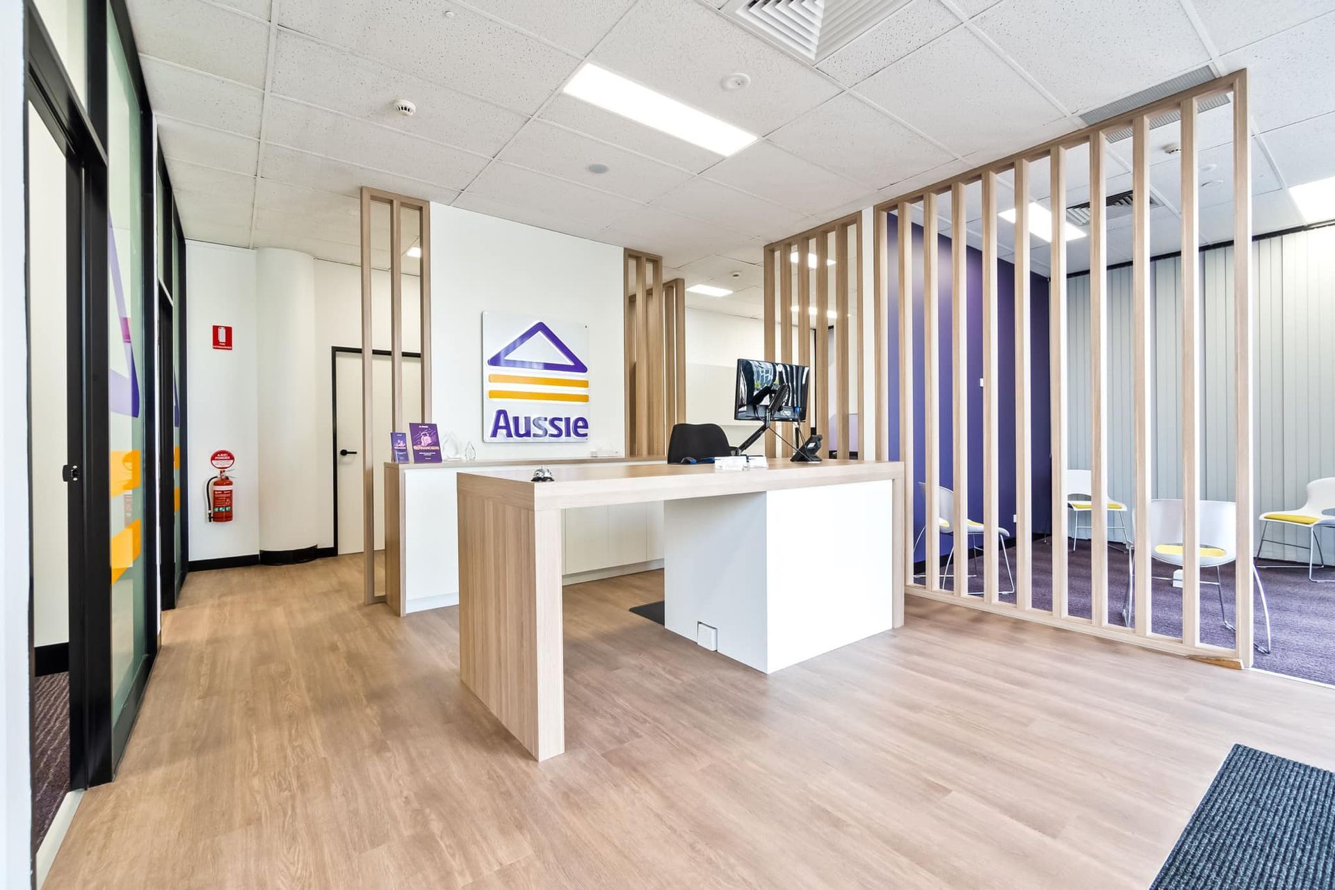Aussie waiting area with wooden floors  — Moltus Construction in Braddon, ACT
