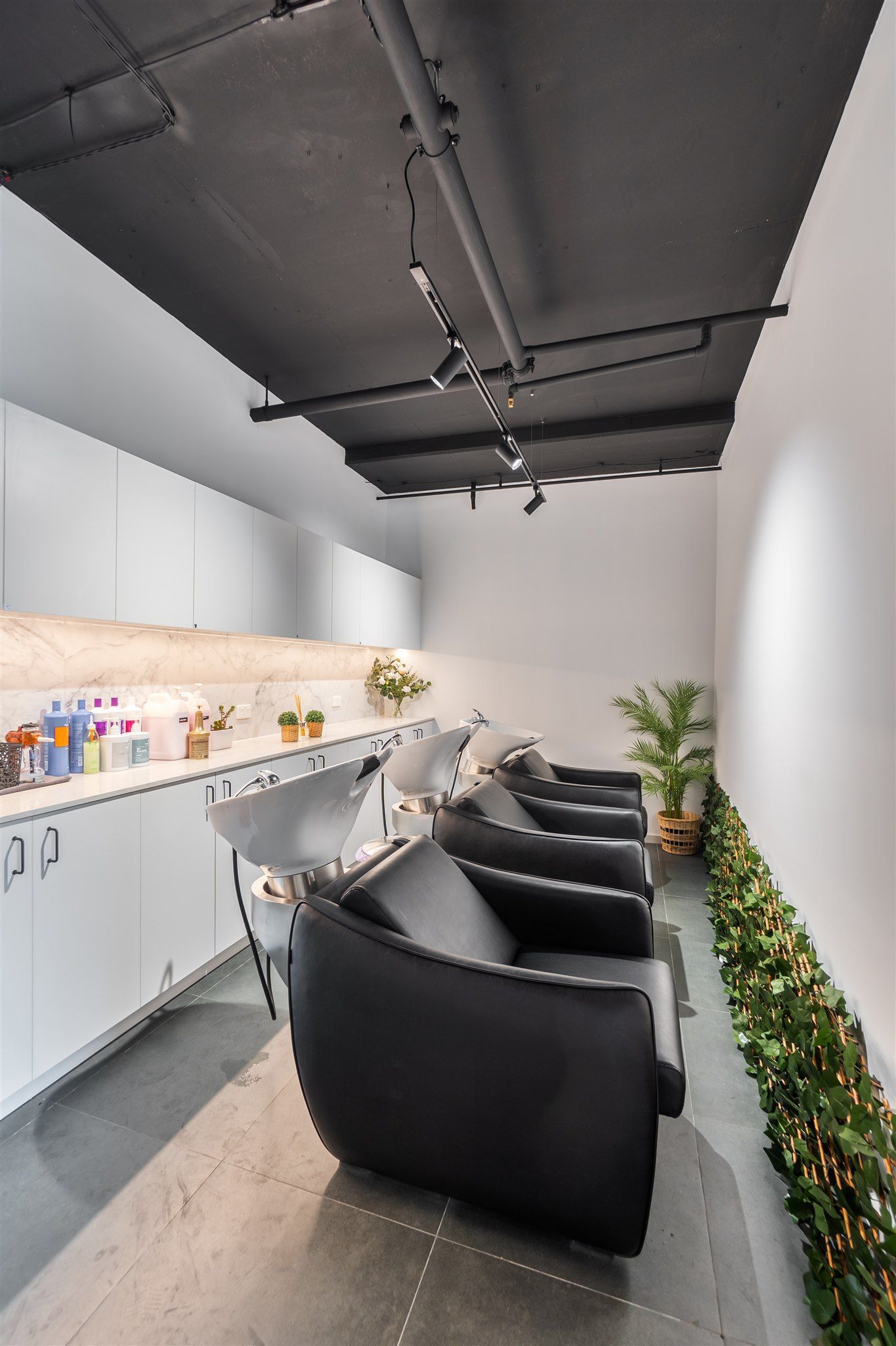 A Room With a Lot of Chairs and a Sink in It — Moltus Construction in Braddon,  ACT