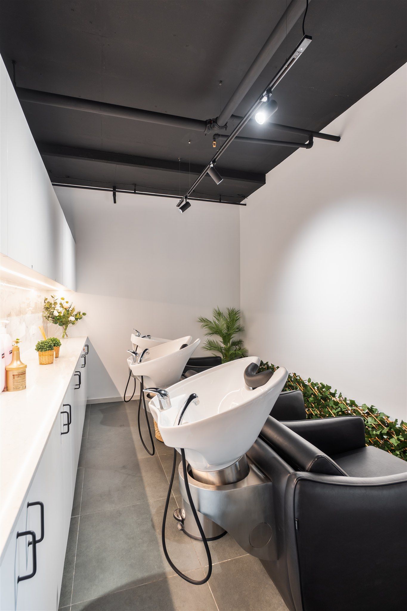 A Room With Two Sinks and Chairs in It — Moltus Construction in Braddon,  ACT