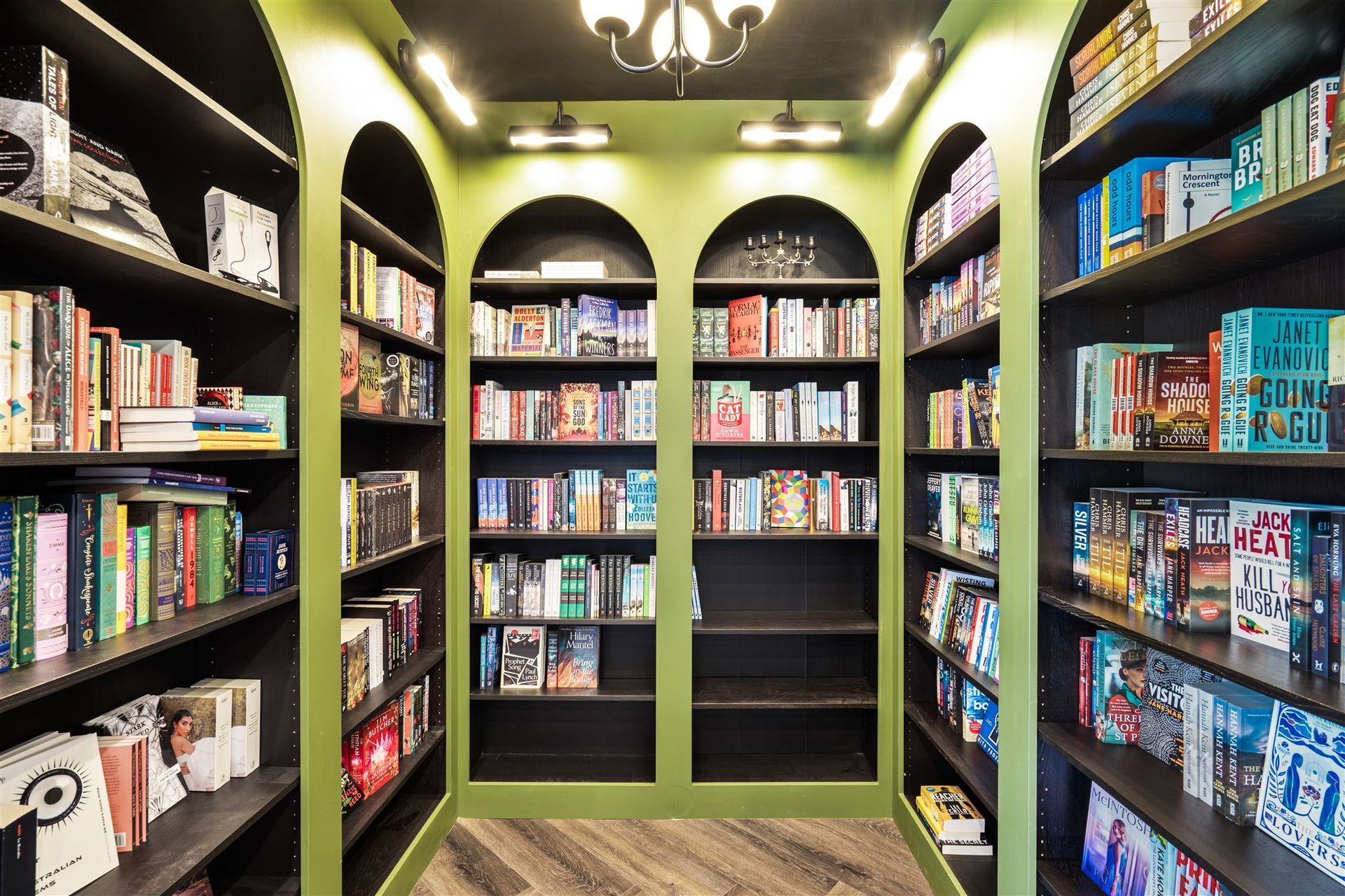 A Library Filled With Lots of Books and Games — Moltus Construction in Braddon, ACT