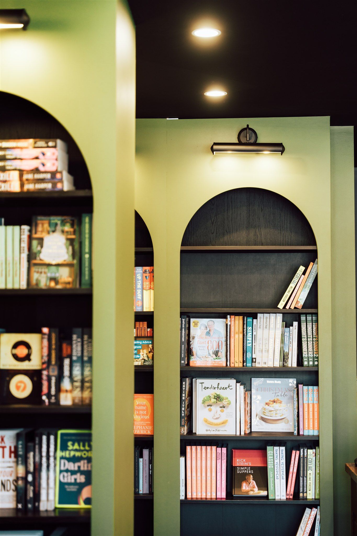A Bookshelf With a Book That Says' Dark Girls' on It — Moltus Construction in Braddon, ACT