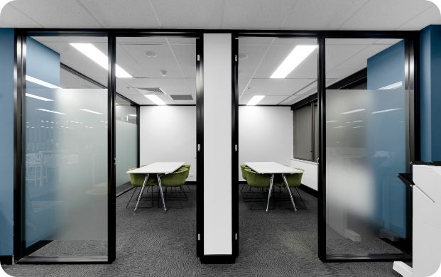 A Conference Room With A Table And Chairs In It  — Moltus Construction in Braddon, ACT