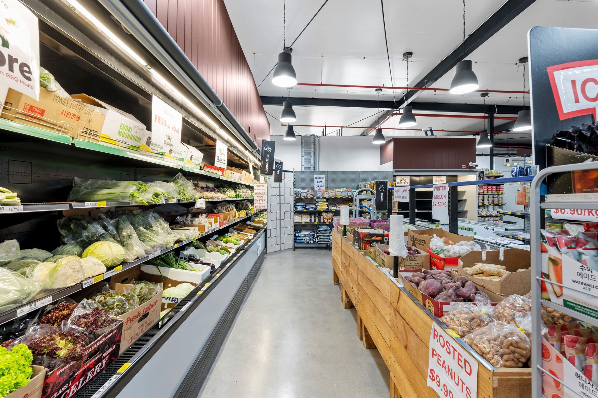 A Grocery Store Filled With Lots of Fruits and Vegetables — Moltus Construction in Braddon,  ACT