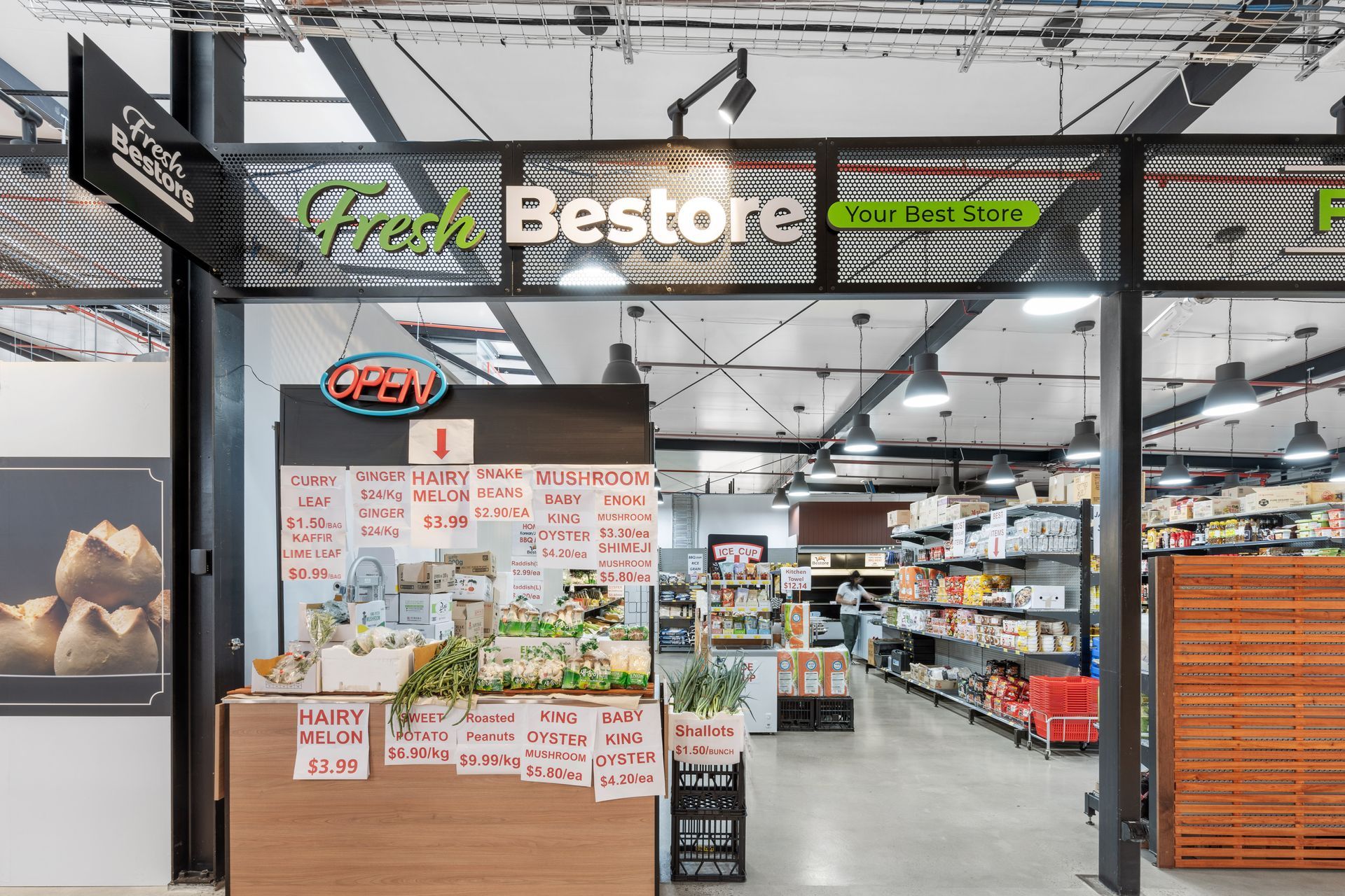 The Inside of a Grocery Store With a Sign — Moltus Construction in Braddon,  ACT